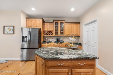 This beautifully maintained brick ranch is ready for its next on Sound Golf Links at Albemarle Plantation in North Carolina - for sale on GolfHomes.com, golf home, golf lot