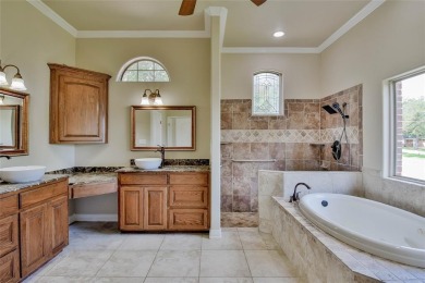 Welcome to this stunning custom-built 3-bedroom, 4-bathroom home on De Cordova Bend Country Club in Texas - for sale on GolfHomes.com, golf home, golf lot
