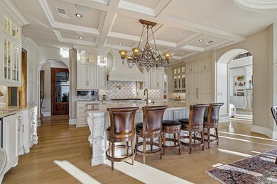 Luxury home with striking European architecture overlooking the on RidgePointe Country Club in Arkansas - for sale on GolfHomes.com, golf home, golf lot