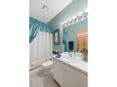 Lake life is calling--and this one answers in style! This on Raintree Country Club in Missouri - for sale on GolfHomes.com, golf home, golf lot