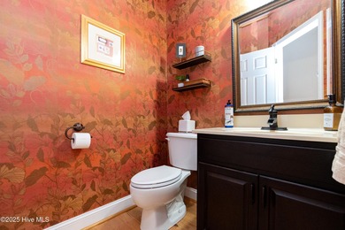 This beautifully maintained brick ranch is ready for its next on Sound Golf Links at Albemarle Plantation in North Carolina - for sale on GolfHomes.com, golf home, golf lot