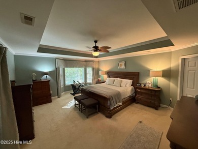 This beautifully maintained brick ranch is ready for its next on Sound Golf Links at Albemarle Plantation in North Carolina - for sale on GolfHomes.com, golf home, golf lot