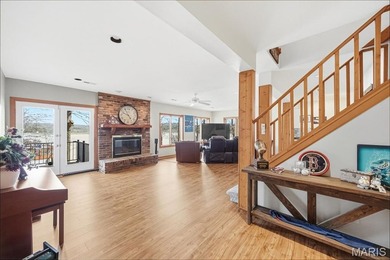 Lake life is calling--and this one answers in style! This on Raintree Country Club in Missouri - for sale on GolfHomes.com, golf home, golf lot