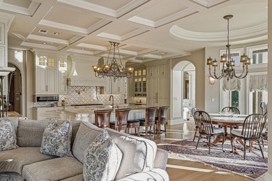 Luxury home with striking European architecture overlooking the on RidgePointe Country Club in Arkansas - for sale on GolfHomes.com, golf home, golf lot