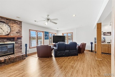 Lake life is calling--and this one answers in style! This on Raintree Country Club in Missouri - for sale on GolfHomes.com, golf home, golf lot