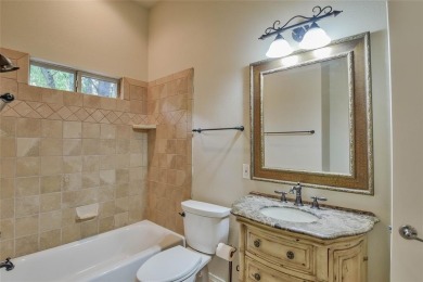 Welcome to this stunning custom-built 3-bedroom, 4-bathroom home on De Cordova Bend Country Club in Texas - for sale on GolfHomes.com, golf home, golf lot