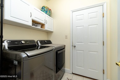 This beautifully maintained brick ranch is ready for its next on Sound Golf Links at Albemarle Plantation in North Carolina - for sale on GolfHomes.com, golf home, golf lot