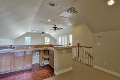 Welcome to this stunning custom-built 3-bedroom, 4-bathroom home on De Cordova Bend Country Club in Texas - for sale on GolfHomes.com, golf home, golf lot