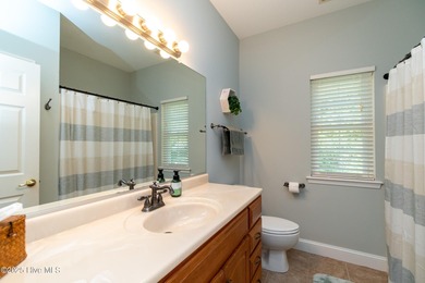 This beautifully maintained brick ranch is ready for its next on Sound Golf Links at Albemarle Plantation in North Carolina - for sale on GolfHomes.com, golf home, golf lot