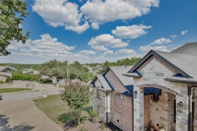 Welcome to this stunning custom-built 3-bedroom, 4-bathroom home on De Cordova Bend Country Club in Texas - for sale on GolfHomes.com, golf home, golf lot