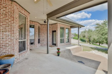 Welcome to this stunning custom-built 3-bedroom, 4-bathroom home on De Cordova Bend Country Club in Texas - for sale on GolfHomes.com, golf home, golf lot