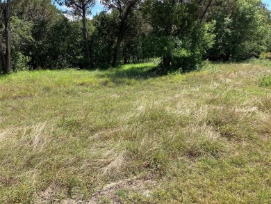 Beautiful .4 acre level lot in desirable golf course community on The Retreat in Texas - for sale on GolfHomes.com, golf home, golf lot