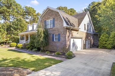 This beautifully maintained brick ranch is ready for its next on Sound Golf Links at Albemarle Plantation in North Carolina - for sale on GolfHomes.com, golf home, golf lot