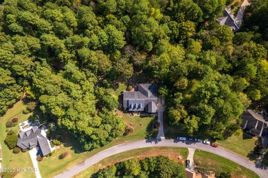 This beautifully maintained brick ranch is ready for its next on Sound Golf Links at Albemarle Plantation in North Carolina - for sale on GolfHomes.com, golf home, golf lot