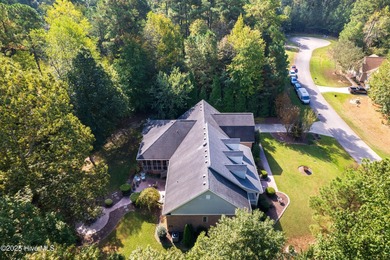 This beautifully maintained brick ranch is ready for its next on Sound Golf Links at Albemarle Plantation in North Carolina - for sale on GolfHomes.com, golf home, golf lot