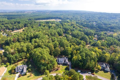 This beautifully maintained brick ranch is ready for its next on Sound Golf Links at Albemarle Plantation in North Carolina - for sale on GolfHomes.com, golf home, golf lot