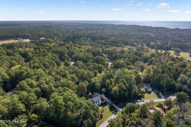 This beautifully maintained brick ranch is ready for its next on Sound Golf Links at Albemarle Plantation in North Carolina - for sale on GolfHomes.com, golf home, golf lot