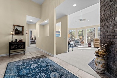 Immaculate golf-front home perfectly positioned on the 12th on Pinewild Country Club of Pinehurst in North Carolina - for sale on GolfHomes.com, golf home, golf lot