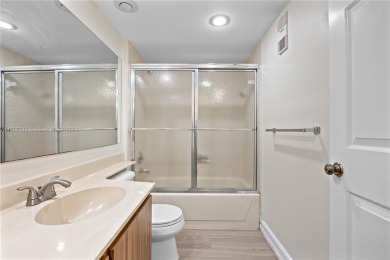 GREAT 2 BEDROOM 2 BATH WHITEHALL CONDO LOCATED IN THE PRIVATE on Pine Island Ridge Country Club in Florida - for sale on GolfHomes.com, golf home, golf lot