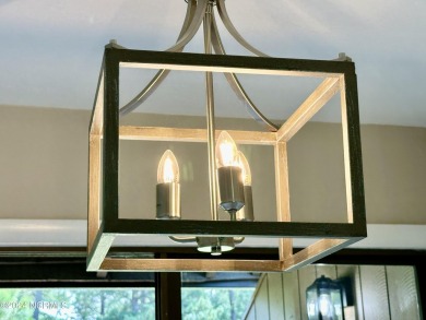 This newly renovated condo nestled between the 16th and 17th on Pinehurst Resort and Country Club in North Carolina - for sale on GolfHomes.com, golf home, golf lot