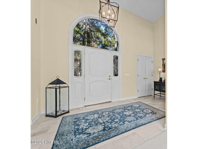 Immaculate golf-front home perfectly positioned on the 12th on Pinewild Country Club of Pinehurst in North Carolina - for sale on GolfHomes.com, golf home, golf lot