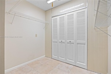 GREAT 2 BEDROOM 2 BATH WHITEHALL CONDO LOCATED IN THE PRIVATE on Pine Island Ridge Country Club in Florida - for sale on GolfHomes.com, golf home, golf lot
