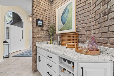 Immaculate golf-front home perfectly positioned on the 12th on Pinewild Country Club of Pinehurst in North Carolina - for sale on GolfHomes.com, golf home, golf lot