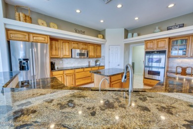 Experience luxury living in this stunning custom-built home on The Refuge Golf and Country Club in Arizona - for sale on GolfHomes.com, golf home, golf lot