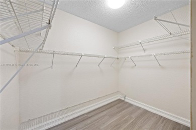 GREAT 2 BEDROOM 2 BATH WHITEHALL CONDO LOCATED IN THE PRIVATE on Pine Island Ridge Country Club in Florida - for sale on GolfHomes.com, golf home, golf lot