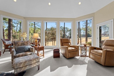Immaculate golf-front home perfectly positioned on the 12th on Pinewild Country Club of Pinehurst in North Carolina - for sale on GolfHomes.com, golf home, golf lot