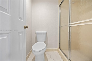 GREAT 2 BEDROOM 2 BATH WHITEHALL CONDO LOCATED IN THE PRIVATE on Pine Island Ridge Country Club in Florida - for sale on GolfHomes.com, golf home, golf lot