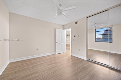 GREAT 2 BEDROOM 2 BATH WHITEHALL CONDO LOCATED IN THE PRIVATE on Pine Island Ridge Country Club in Florida - for sale on GolfHomes.com, golf home, golf lot