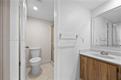 GREAT 2 BEDROOM 2 BATH WHITEHALL CONDO LOCATED IN THE PRIVATE on Pine Island Ridge Country Club in Florida - for sale on GolfHomes.com, golf home, golf lot