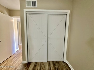 This newly renovated condo nestled between the 16th and 17th on Pinehurst Resort and Country Club in North Carolina - for sale on GolfHomes.com, golf home, golf lot