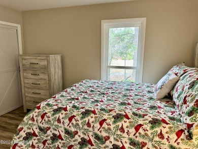 This newly renovated condo nestled between the 16th and 17th on Pinehurst Resort and Country Club in North Carolina - for sale on GolfHomes.com, golf home, golf lot