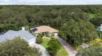 Complete privacy in prime location! Gorgeous pool home with no on The Meadows Golf and Country Club in Florida - for sale on GolfHomes.com, golf home, golf lot