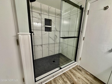 This newly renovated condo nestled between the 16th and 17th on Pinehurst Resort and Country Club in North Carolina - for sale on GolfHomes.com, golf home, golf lot