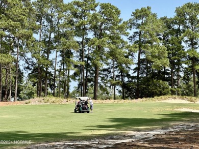This newly renovated condo nestled between the 16th and 17th on Pinehurst Resort and Country Club in North Carolina - for sale on GolfHomes.com, golf home, golf lot