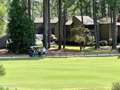 This newly renovated condo nestled between the 16th and 17th on Pinehurst Resort and Country Club in North Carolina - for sale on GolfHomes.com, golf home, golf lot