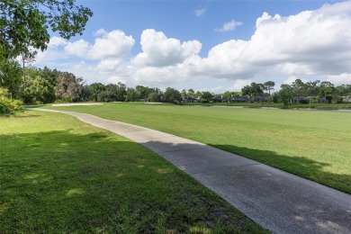 Come see this Beautiful Mediterranean Style Home on the Golf on Tuscawilla Country Club in Florida - for sale on GolfHomes.com, golf home, golf lot