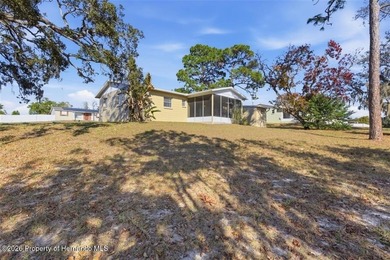 Move right into this thoughtfully updated 2 bedroom, 1.5 on Oak Hills Country Club in Florida - for sale on GolfHomes.com, golf home, golf lot