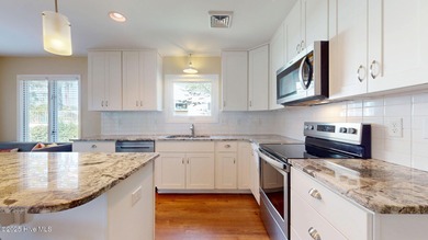 Don't miss this rare opportunity to own a waterfront home with a on Harbour Point Golf Club in North Carolina - for sale on GolfHomes.com, golf home, golf lot