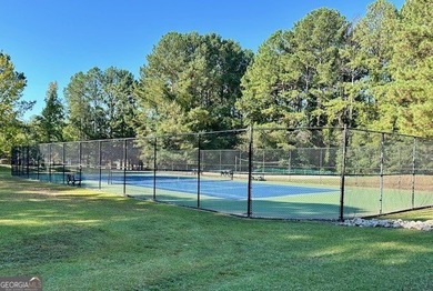 Terrific home in one of Peachtree City's most desired areas on Canongate At Flat Creek Club in Georgia - for sale on GolfHomes.com, golf home, golf lot