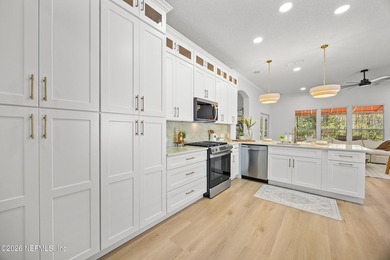 Welcome to luxury living in the highly sought-after St. Johns on St. Johns Golf and Country Club in Florida - for sale on GolfHomes.com, golf home, golf lot