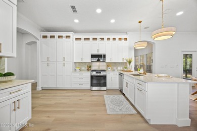 Welcome to luxury living in the highly sought-after St. Johns on St. Johns Golf and Country Club in Florida - for sale on GolfHomes.com, golf home, golf lot