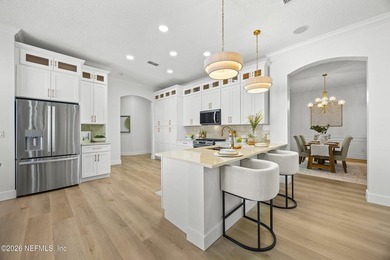 Welcome to luxury living in the highly sought-after St. Johns on St. Johns Golf and Country Club in Florida - for sale on GolfHomes.com, golf home, golf lot