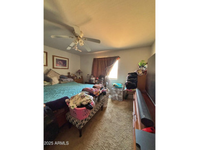 Welcome to this charming 3-bedroom, 2-bathroom home on a on Arizona City Golf Club in Arizona - for sale on GolfHomes.com, golf home, golf lot
