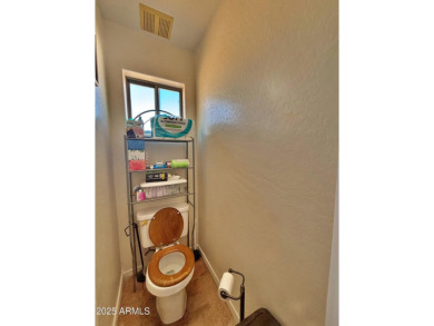 Welcome to this charming 3-bedroom, 2-bathroom home on a on Arizona City Golf Club in Arizona - for sale on GolfHomes.com, golf home, golf lot