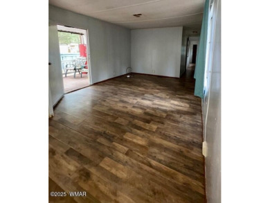 Check out this 2 bedroom, 1 bath home nestled in the tall pines on Bison Golf and Country Club in Arizona - for sale on GolfHomes.com, golf home, golf lot
