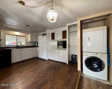 Check out this 2 bedroom, 1 bath home nestled in the tall pines on Bison Golf and Country Club in Arizona - for sale on GolfHomes.com, golf home, golf lot